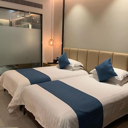 นิวเซ็นจูรี่ จ้าวซิง จินชาง โฮเต็ล Hotel Keqiao ภายนอก รูปภาพ